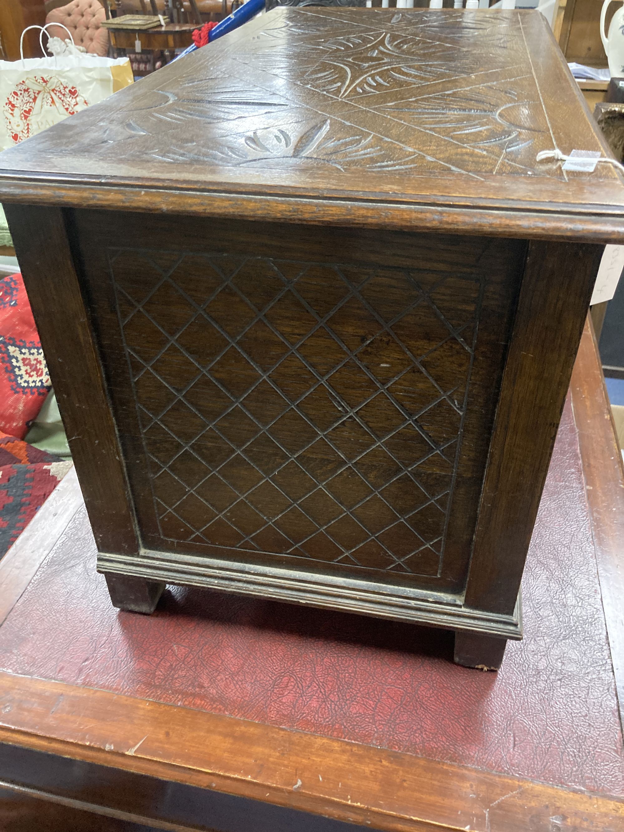A small 18th century style carved oak coffer, width 90cm, depth 45cm, height 48cm